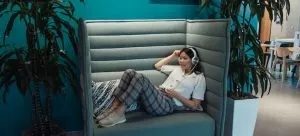 a woman listening to the music while trying to adapt to a new language