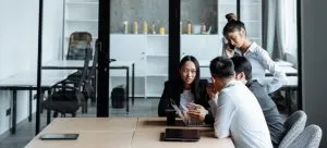 Workers having a meeting before moving office