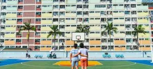 Two boys standing on the basketball court