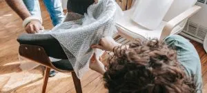 A couple covering a chair.