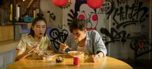 A couple eating together in Hong Kong