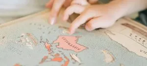 child and mother pointing at Australia