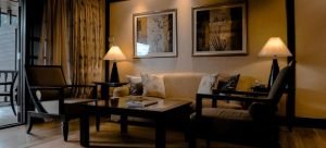 a living room lighted with table lamps