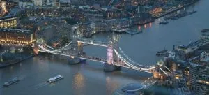 A bridge in downtown London at night
