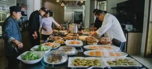People in the kitchen embracing Hong Kong's traditions and customs after moving