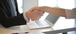 two people shaking hands
