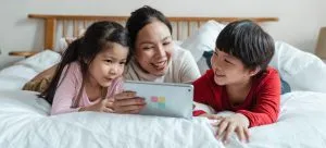 Happy family after moving trying to staying connected with loved ones