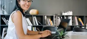 a girl in the office exploring about moving from Hong Kong to New York City
