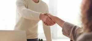 two person shaking hands