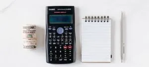 calculator pen and notes