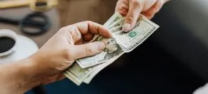 giving money hands