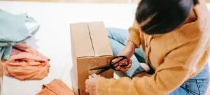 Asian girl packing