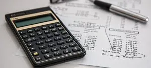 A calculator and a pen.