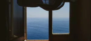 An open window and a view of the sea