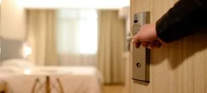 A man opening door